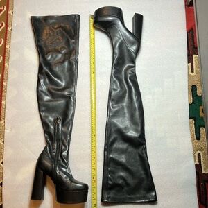 Black thigh high PU platform boots. Unworn.